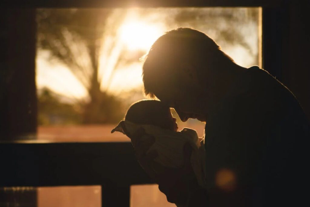 person holding baby