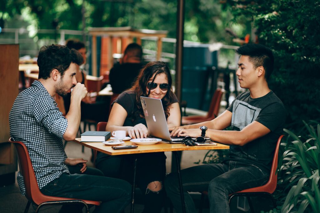 Millennials at a coffee shop talking