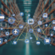 Warehouse background with web of interconnected icons ranging from iPhone, airplane, laptop, location, shopping cart, and graphs