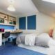 Modern Unilife student accommodation room in Guildford with study desk