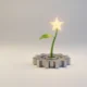 Steel gear sprouting a single green shoot topped with a golden star on a soft neutral background.