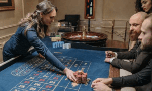 Players around a roulette table