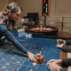 Players around a roulette table