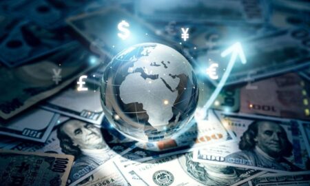 globe-on-top-of-us-money (1)