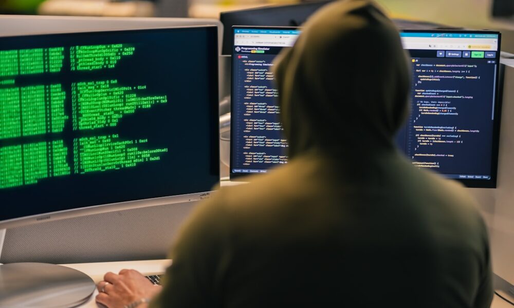Cybersecurity and AI threat detection concept with dark digital network visualisation representing the modern cyber threat landscape