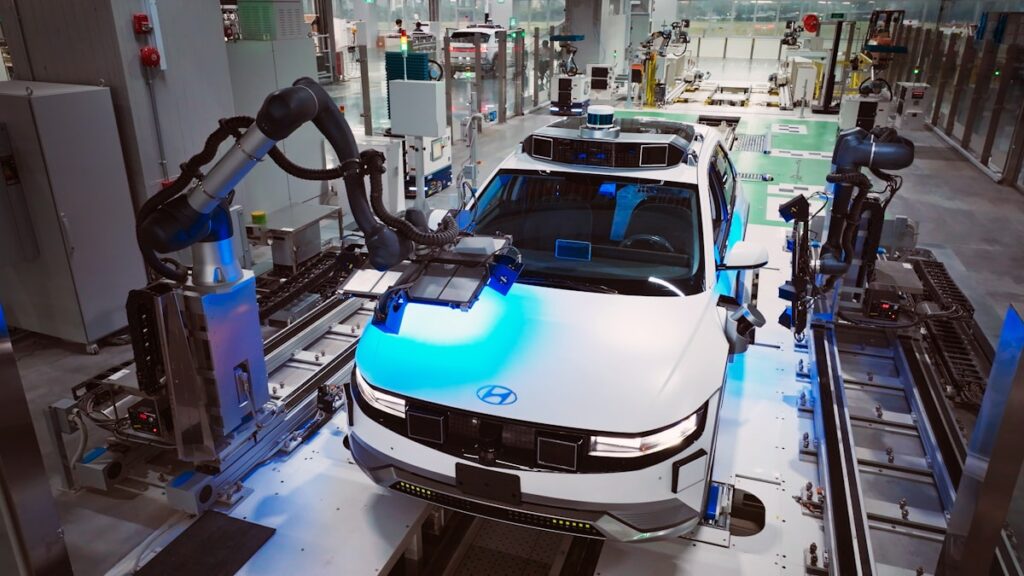 Digital twin technology concept showing virtual and physical manufacturing systems converging in smart factory environment