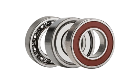 Comparison of various industrial deep groove ball bearing types and cage materials, highlighting the danger of treating precision components as generic hardware 