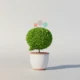 Minimalist potted plant shaped like a speech bubble, symbolizing nurtured social media growth on a soft neutral background.