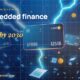 Stylised payment cards floating with glowing lightning arcs between bank silhouettes, scattered fragments of receipts and authorization tokens, particle field.