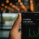 Investor analyzing stock market charts and ETF performance data for smart investing strategies and long-term financial growth
