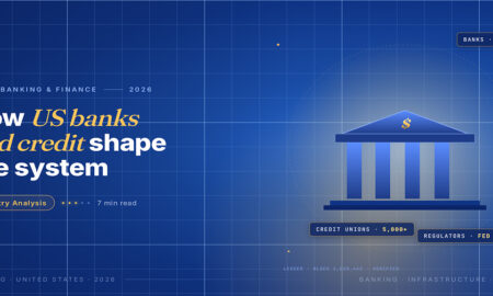 TechBullion Tier 1 editorial featured image for Financial systems and institutions in the US: how banks, credit unions, and the regulator constellation hold up the syst, with a topic-unique SVG metaphor and a Fraunces italic gold keyword phrase "US banks and credit" in the headline on the navy gradient editorial composite.