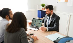 Three people in meeting