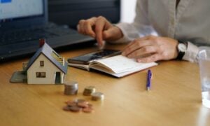 Best rent payment reporting service comparison showing IdentityIQ vs. LevelCredit for building credit with rent payment reporting.