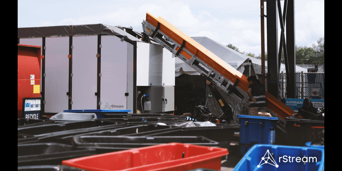 rStream's AI-powered sorting system, a 30-foot integrated conveyor and sorting platform, combines computer vision, precision actuation, and machine learning to automatically separate the full waste stream at the source—offering a glimpse into the future of automated waste management at large venues.