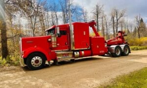 Heavy-duty tow truck preparing to recover a commercial vehicle in Denver