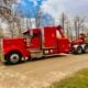 Heavy-duty tow truck preparing to recover a commercial vehicle in Denver