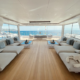 Luxury yacht in the Bay of Naples offering a premium viewing position for the 2027 America's Cup racing.