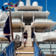 Luxury charter yachts at the Monaco Yacht Show in Port Hercule, where DMA Yachting meets clients planning French Riviera yacht charters.