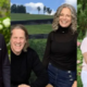 Collage of New York real estate professionals with luxury waterfront homes, Hamptons estates, Finger Lakes properties and Catskills countryside representing diverse real estate markets across New York State.