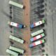 Why Is Traditional Logistics Process Automation Failing in High-Density Cargo Hubs? Automation has become a major priority for logistics operators. Ports, airports, distribution centers, and logistics parks are adopting autonomous vehicles, automated storage systems, intelligent scheduling, and AI-powered software to move cargo faster and reduce operating costs. Yet a contradiction is becoming increasingly visible: some of the world's most automated cargo facilities still struggle with congestion, waiting time, inefficient handoffs, and manual intervention. The problem is not necessarily that automation does not work. Rather, traditional logistics process automation often focuses on individual tasks instead of the movement of cargo as a whole. That distinction becomes critical in high-density cargo hubs, where hundreds of vehicles, shipments, loading areas, and operational decisions interact continuously. The Automation Paradox in High-Density Cargo Hubs Traditional automation typically begins with a simple question: Which repetitive task can be automated? That approach works well for activities such as sorting, picking, storage, and transportation. Machines can perform repetitive operations consistently and, in many cases, faster than manual labor. The challenge emerges when many automated processes operate simultaneously. Consider an autonomous vehicle transporting cargo from a warehouse to a loading area. The vehicle may be functioning perfectly, but the loading area could already be occupied. The vehicle waits. Another vehicle arrives and waits behind it. Cargo begins accumulating upstream. Nothing has technically failed. The individual automated tasks are working exactly as designed. The problem is that the system has optimized a movement without optimizing the flow. This is the central weakness of traditional automation in high-density environments: a collection of efficient automated tasks can still create an inefficient logistics network. When Automation Optimizes the Machine Instead of the Flow A fleet management system may try to minimize vehicle idle time. A warehouse system may prioritize order fulfillment. A terminal system may focus on equipment utilization. Each objective makes sense independently, but logistics operations are interconnected. A vehicle dispatched too early may arrive before cargo is ready. A warehouse optimized for storage density may increase internal transportation distances. A terminal optimized for equipment utilization may create queues at transfer points. As a result, individual components can appear productive while the overall operation remains constrained. This is why automation should not be evaluated solely through equipment-level metrics. The more important question is whether cargo is moving through the facility with fewer interruptions and less waiting. If autonomous vehicles complete more trips but cargo dwell time remains unchanged, the operation has not necessarily become more efficient. Automation creates the most value when it improves the entire flow rather than simply accelerating individual tasks. Static Scheduling Cannot Keep Up With Dynamic Cargo Flows High-density cargo hubs are rarely static. Shipment priorities change. Loading areas become unavailable. Traffic conditions fluctuate. Vehicles encounter unexpected delays. Aircraft and vessel schedules shift. A sudden demand increase can change the optimal allocation of resources within minutes. Traditional automation often relies on predefined rules: assign a task, select a vehicle, determine a route, and execute the movement. That model becomes less effective as operational variability increases. A route that was optimal ten minutes ago may no longer be optimal. A vehicle that appeared to be the best choice may suddenly be needed elsewhere. A destination that was available may become congested. This is why the next stage of logistics automation needs to move beyond fixed scheduling toward continuous decision-making. Instead of simply executing a plan, an intelligent system can reassess current conditions and adjust assignments, routes, and priorities as the operation changes. The difference is fundamental: Traditional automation executes the plan. Intelligent automation continuously improves the plan. Data Silos Turn Automated Systems Into Digital Islands Another major obstacle is fragmented data. A warehouse management system may know where cargo is. A fleet management system knows where vehicles are. A transportation system understands shipment requirements, while a terminal platform may contain information about yard operations. Each system can work correctly while still lacking the broader context needed to make good decisions. This creates digital islands inside an automated facility. For example, a fleet system may dispatch a vehicle because it identifies an available task. But if the destination is experiencing a temporary bottleneck, the vehicle simply arrives and waits. The fleet system has not necessarily made a technical error. It has made a decision based on incomplete operational information. This is why data integration has become increasingly important in logistics digitalization. McKinsey has identified fragmented technology environments, data quality, and integration challenges among the barriers preventing logistics companies from capturing the full value of digital investments. The objective should therefore not be to connect more devices for the sake of connectivity. It should be to create a shared operational picture that allows different systems to make decisions using the same real-time information. Why the Last Few Hundred Meters Matter Long-distance transportation attracts much of the attention in logistics, but some of the most persistent bottlenecks occur inside the facility itself. Cargo may need to move between an aircraft and terminal, terminal and warehouse, warehouse and staging area, or staging area and loading zone. Each individual movement may be short. Collectively, these movements can determine the speed of the entire operation. The problem becomes particularly significant when numerous vehicles compete for the same roads, transfer points, or loading areas. At that point, the question is no longer whether an autonomous vehicle can move cargo efficiently. The question is whether the entire fleet can move cargo without creating congestion elsewhere. This is one area where intelligent autonomous transportation is gaining attention. Westwell, for example, focuses on autonomous short-haul transportation and AI-based coordination for cargo environments, illustrating the broader industry shift toward treating internal transportation as part of an integrated logistics system rather than a series of isolated vehicle movements. For high-density hubs, this shift can be particularly important because short-distance transportation happens continuously and affects multiple downstream processes. More Automation Does Not Always Mean Less Complexity Adding automated equipment can increase productivity, but it can also increase system complexity. A modern facility may combine autonomous vehicles, automated cranes, conveyors, warehouse robots, computer vision, warehouse management systems, fleet platforms, and terminal software. Every technology may solve a specific problem. But without an effective coordination layer, the number of interfaces and dependencies also increases. The problem becomes even more obvious during unexpected events. If a loading zone becomes unavailable, which vehicles should be redirected? Should existing tasks be canceled? Which shipment should receive priority? Where should idle vehicles wait? These are not simply equipment questions. They are operational decisions. Research into warehouse automation has similarly emphasized the importance of aligning technology investments with broader operational strategy rather than treating automation as an isolated equipment project. Successful automation should therefore reduce operational complexity rather than simply digitize it. From Process Automation to Intelligent Orchestration The next evolution of logistics automation can be understood as a shift from execution to orchestration. Traditional automation follows a relatively simple sequence: Task → Instruction → Execution → Completion A more intelligent model looks like: Data → Decision → Coordination → Execution → Feedback The difference is that execution is no longer the end of the process. Every movement generates new information. Vehicle locations change. Cargo priorities change. Loading areas become available or unavailable. Traffic conditions evolve. The system can use those changes to influence the next decision. This creates a continuous feedback loop in which the logistics network adapts to actual operating conditions rather than simply following a predetermined plan. AI can play an important role in this model by helping analyze large volumes of operational data, identify changing conditions, optimize routes, and adjust priorities. Human operators remain important, but their role changes. Instead of manually coordinating disconnected automated systems, they can focus more on supervision, safety, exception management, and decisions that require human judgment. What Should Logistics Operators Measure? This shift also requires companies to rethink how they evaluate automation. Equipment utilization remains useful, but it does not tell the whole story. Cargo dwell time, vehicle empty-running, queue duration, task completion time, and the frequency of human intervention can reveal whether automation is actually improving the overall flow. For example, a vehicle fleet with extremely high utilization may appear efficient. But if vehicles spend much of their time moving empty or waiting at congested transfer points, high utilization does not necessarily translate into better logistics performance. System-level metrics provide a clearer picture because they connect automation directly to business outcomes. The goal is not simply to make machines busier. It is to make cargo move more efficiently. The Future Is Not Simply More Robots The next stage of logistics automation will not be defined solely by how many robots or autonomous vehicles a facility deploys. It will be defined by how effectively those technologies work together. Autonomous vehicles can handle physical transportation. Software can connect operational information. AI can help interpret changing conditions and optimize decisions. Human operators can manage exceptions and maintain operational oversight. When these capabilities remain disconnected, automation creates isolated pockets of efficiency. When they are coordinated, they can create a more adaptive logistics network. This distinction will become increasingly important as cargo hubs grow larger and more complex. A small facility may compensate for inefficient scheduling through manual intervention. A large, high-density hub cannot depend on that approach indefinitely. At a certain scale, coordination itself becomes an automation problem. Automation Should Optimize the Network, Not the Machine Traditional logistics process automation is not failing because automated equipment is ineffective. It is reaching its limits because high-density logistics environments have become too interconnected for isolated automation to deliver the best possible results. A faster vehicle does not necessarily mean faster cargo movement. A more automated warehouse does not automatically eliminate bottlenecks. More software does not automatically create better decisions. The real opportunity lies in connecting these components into a system capable of sensing changing conditions, making decisions, coordinating resources, and continuously adapting. For logistics operators, the strategic question is therefore changing. Instead of asking, “Which task should we automate next?”, companies should ask: “How can we coordinate every automated movement so that improving one part of the operation does not create a bottleneck somewhere else?” That shift—from automating individual tasks to intelligently orchestrating the entire flow—could determine whether the next generation of cargo hubs simply becomes more automated or genuinely becomes more efficient. Frequently Asked Questions What is logistics process automation? Logistics process automation refers to using software, automated equipment, robotics, and intelligent systems to reduce manual work across logistics operations. It can include transportation, warehousing, sorting, scheduling, inventory handling, and cargo movement. Why does traditional logistics automation struggle in high-density cargo hubs? The main issue is that high-density hubs involve many interconnected processes. Automating individual tasks does not necessarily solve congestion, scheduling conflicts, data silos, or inefficient handoffs between different operational areas. Can AI improve logistics process automation? Yes. AI can analyze real-time operational data and help optimize routing, scheduling, resource allocation, and responses to changing conditions. Its greatest value comes when it supports coordination across the wider logistics network rather than optimizing only one machine or process. Does logistics automation eliminate the need for human workers? Not necessarily. Effective automation can reduce repetitive manual work while allowing people to focus on supervision, safety, exception handling, and higher-level operational decisions. What is the difference between automation and intelligent orchestration? Automation generally focuses on executing predefined tasks, while intelligent orchestration coordinates multiple processes dynamically. The latter considers the relationship between cargo, vehicles, infrastructure, schedules, and changing operational conditions. How can companies measure whether logistics automation is working? Beyond equipment utilization, companies should examine system-level indicators such as cargo dwell time, queue time, empty vehicle movements, task completion time, throughput, and the amount of manual intervention required. Conclusion Traditional logistics process automation is not becoming less valuable; it is becoming insufficient on its own. As cargo hubs grow denser and more interconnected, automating individual tasks cannot fully address congestion, scheduling conflicts, fragmented data, and inefficient handoffs. The next step is to connect automated equipment, operational data, and intelligent decision-making into a system that can respond to changing conditions in real time. Instead of simply making individual machines faster, logistics operators need to make the entire cargo flow more coordinated and adaptable. For high-density cargo hubs, the real measure of automation is therefore not how many processes can run without human input, but how effectively the entire operation can move cargo with fewer delays and less wasted capacity.