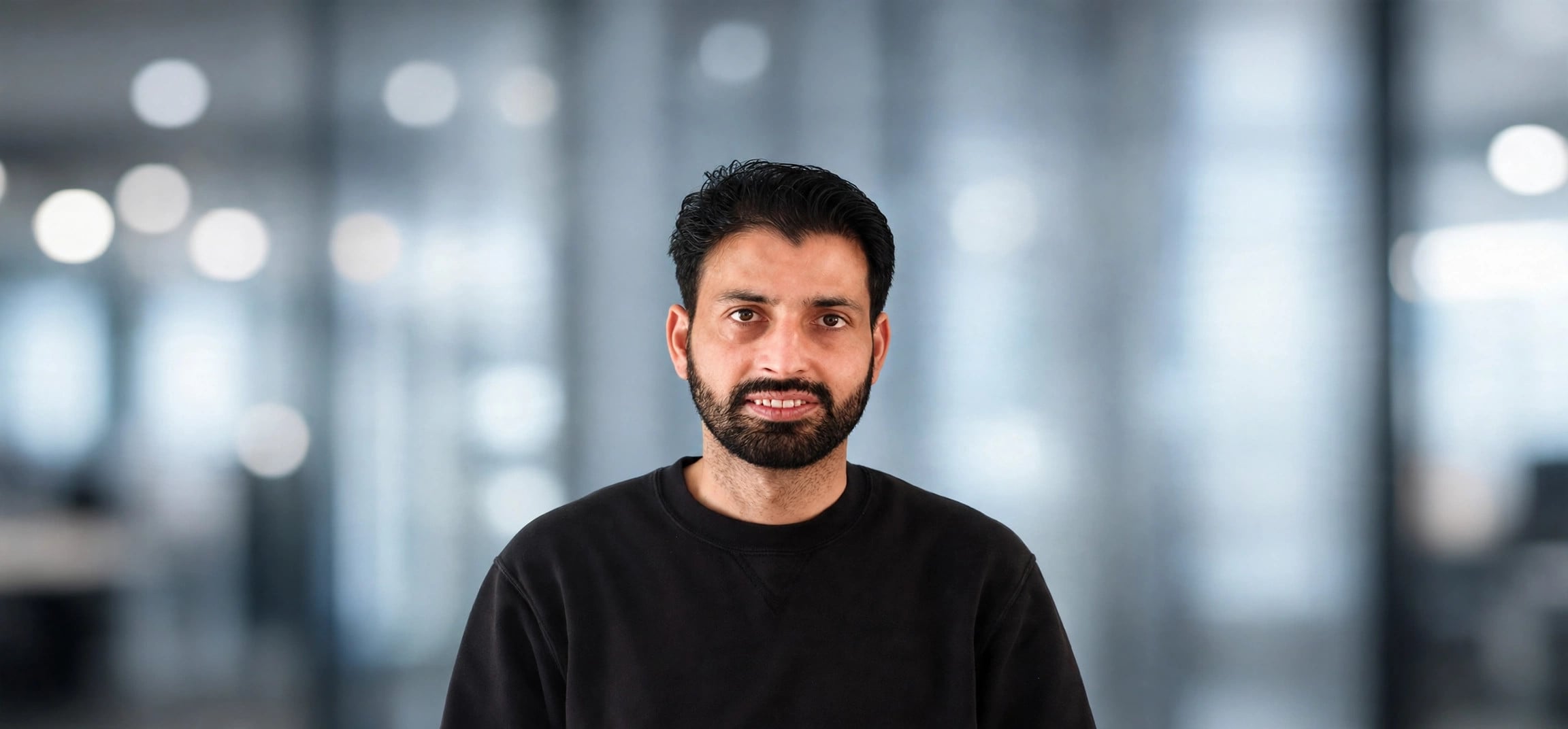 Prashant Singh Tewatia portrait with blurred office background